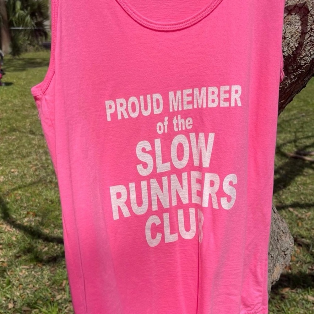 Brand new never worn Slow
Runners Club tank top size Medium
